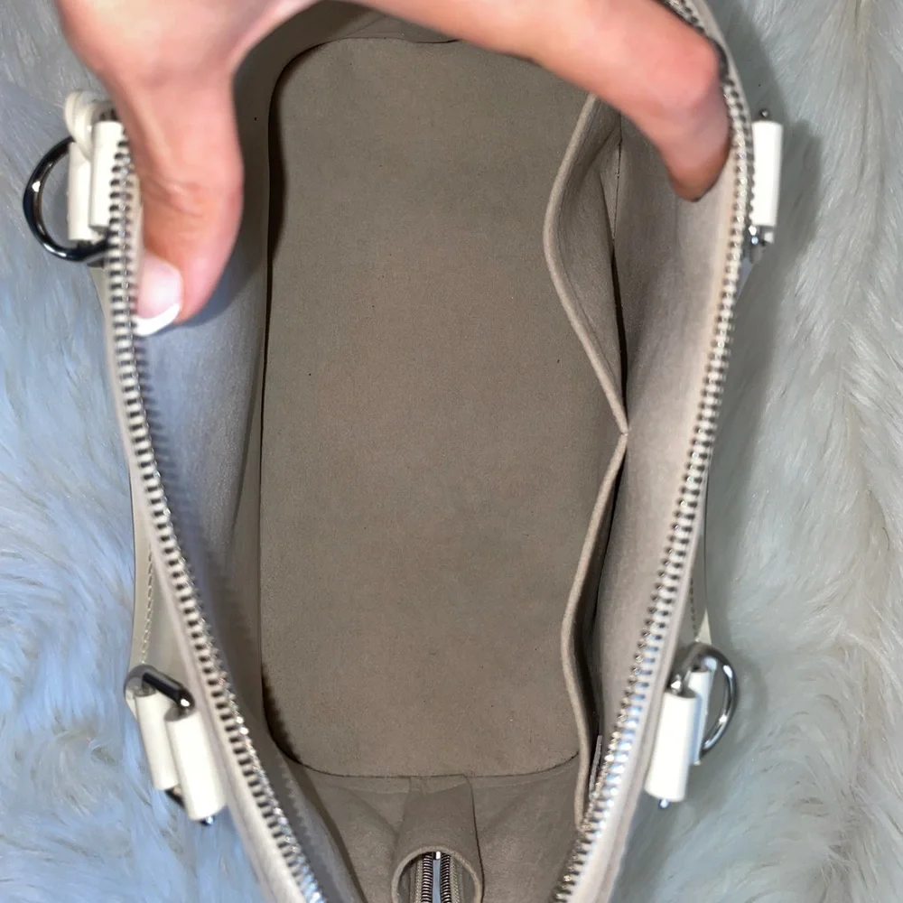 Louis Vuitton Alma Handbag in Cream